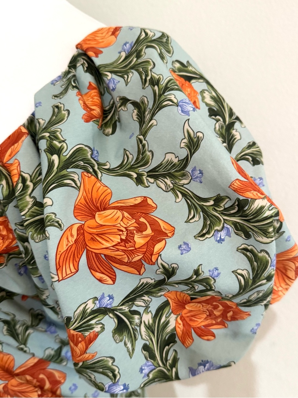Agua Bendita Orange Floral Ruched Midi Dress on Light Blue - Picture 4 of 6